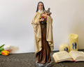 Hand-painted Saint Therese of Lisieux statue holding crucifix and roses