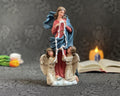 Hand-painted Our Lady Undoer of Knots statue with angels and ribbon detail
