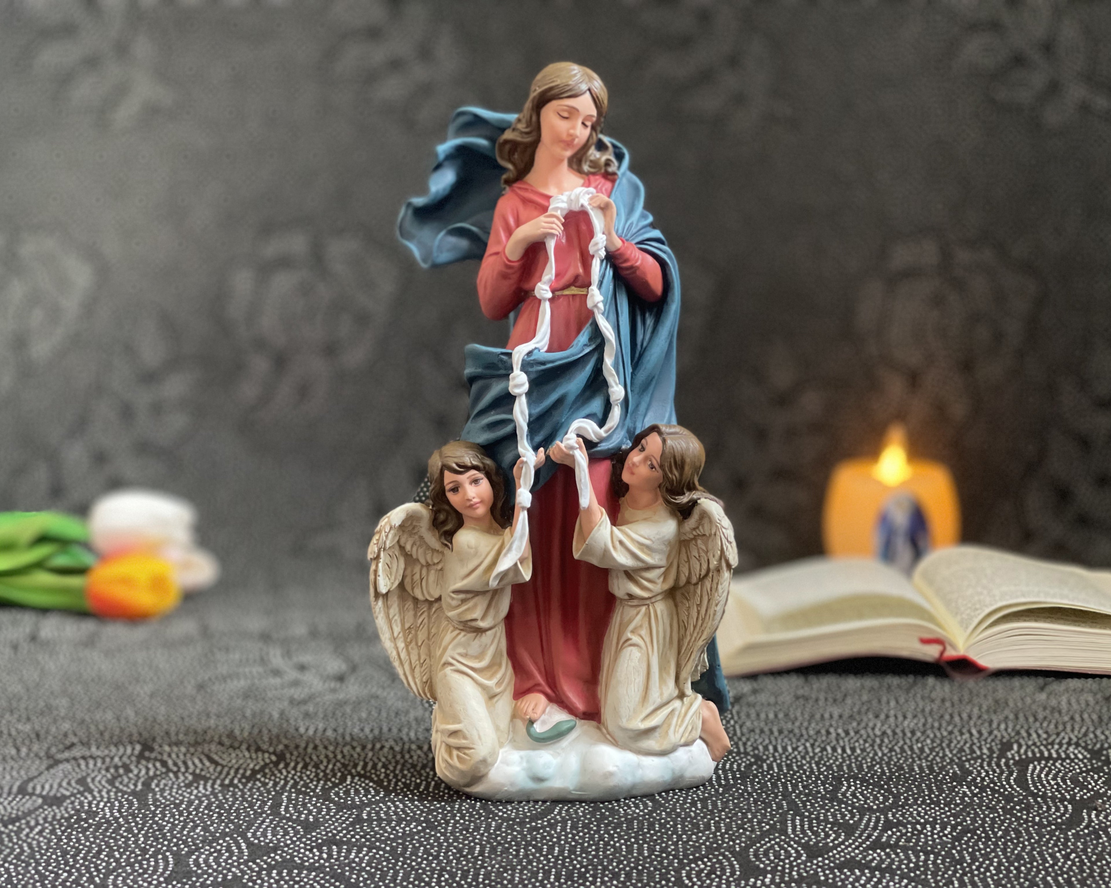 Hand-painted Our Lady Undoer of Knots statue with angels and ribbon detail