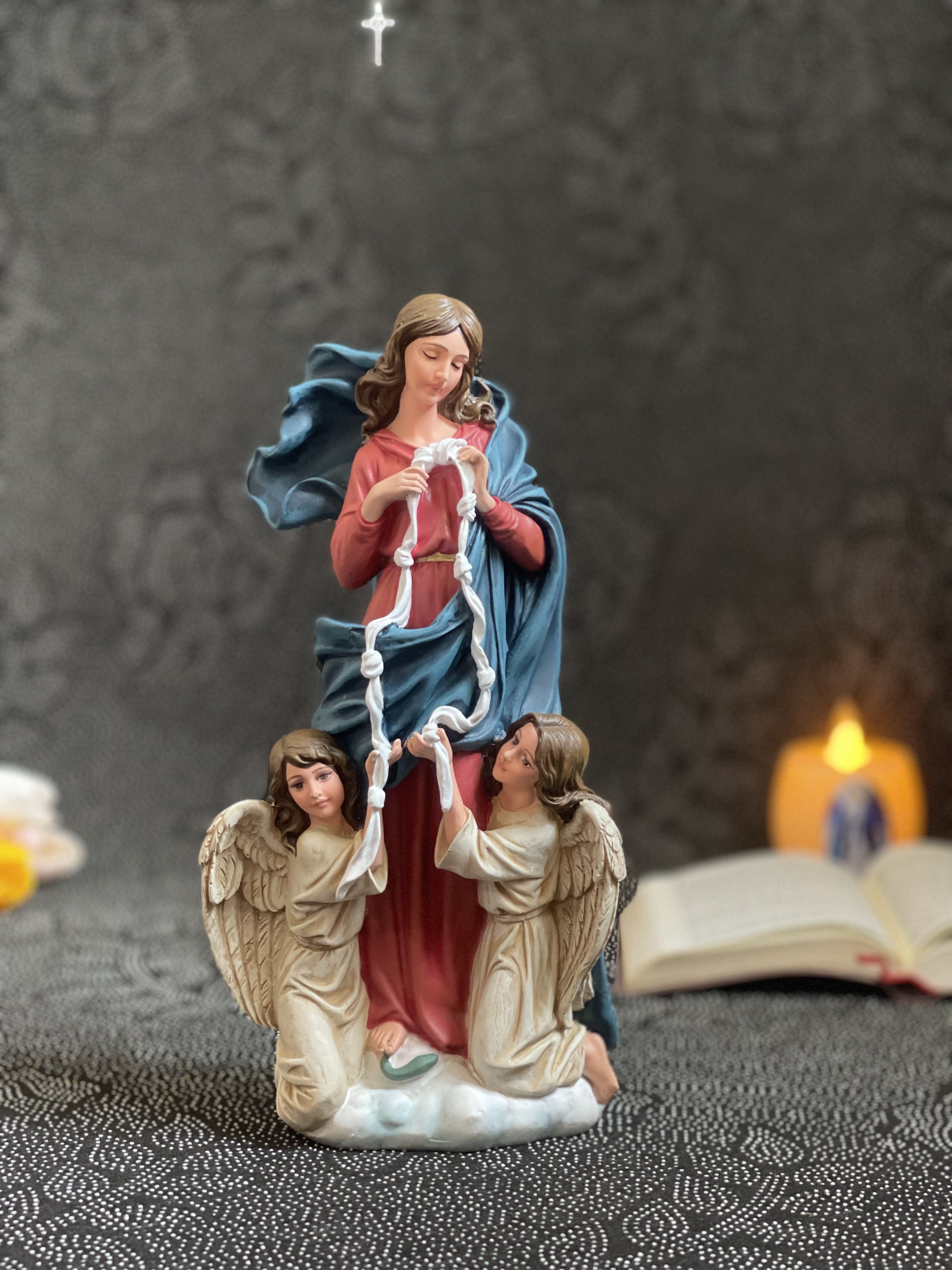 Hand-painted Our Lady Undoer of Knots statue with angels and ribbon detail