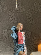 Hand-painted Our Lady Undoer of Knots statue with angels and ribbon detail