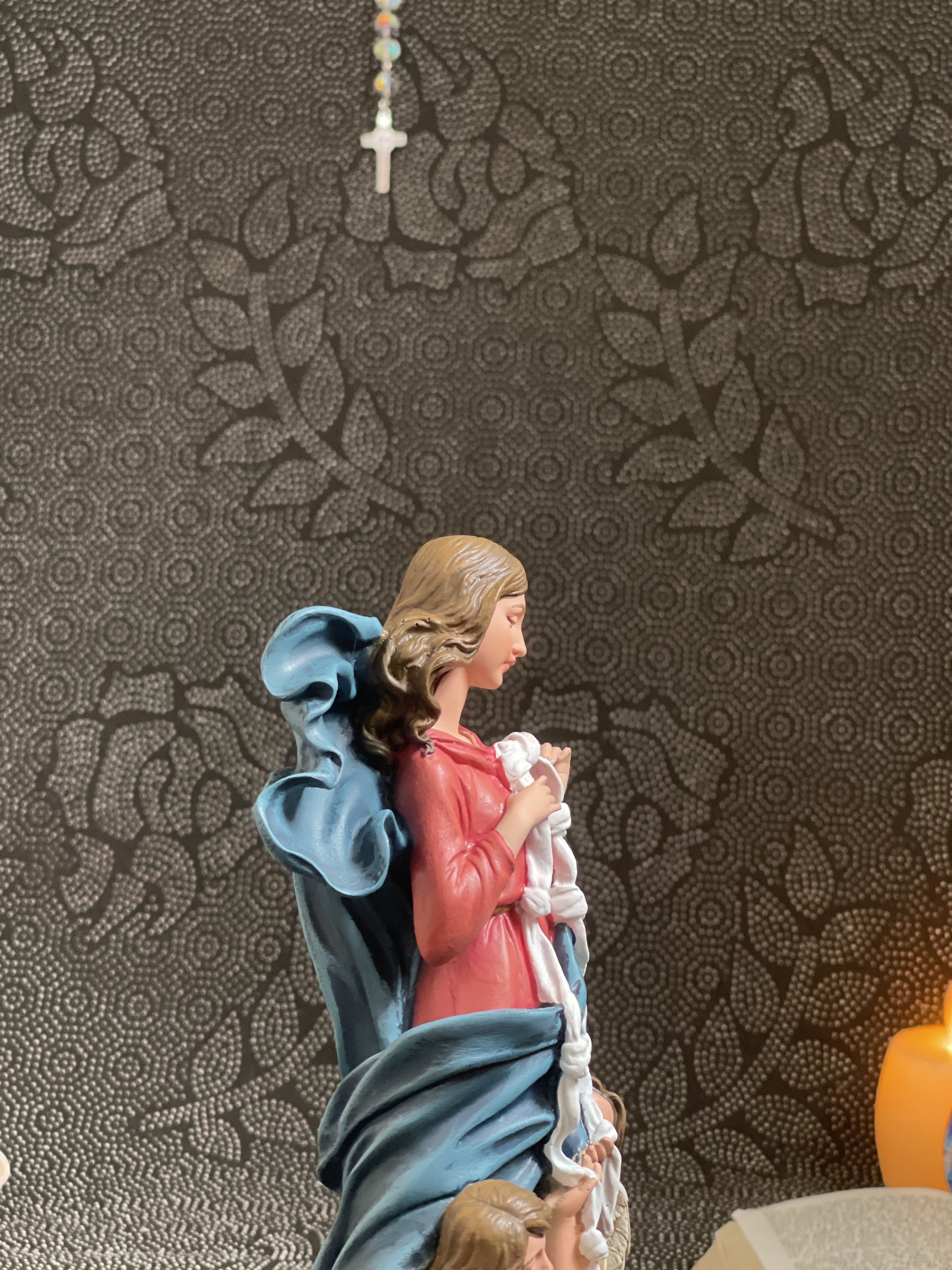 Hand-painted Our Lady Undoer of Knots statue with angels and ribbon detail