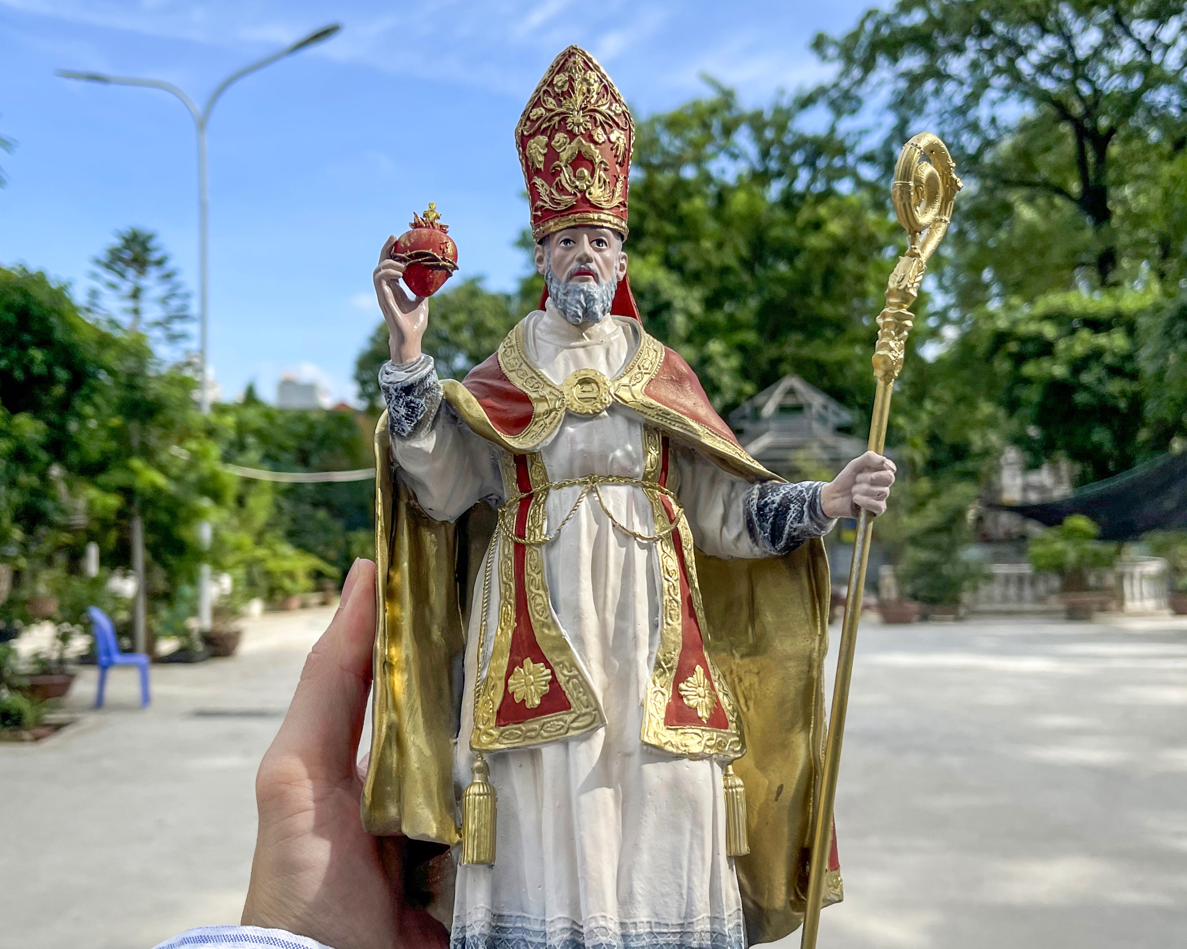 Hand-painted Saint Augustine of Hippo statue with mitre, crozier, and flaming heart