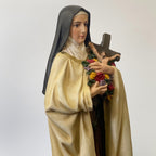 Hand-painted Saint Therese of Lisieux statue holding crucifix and roses