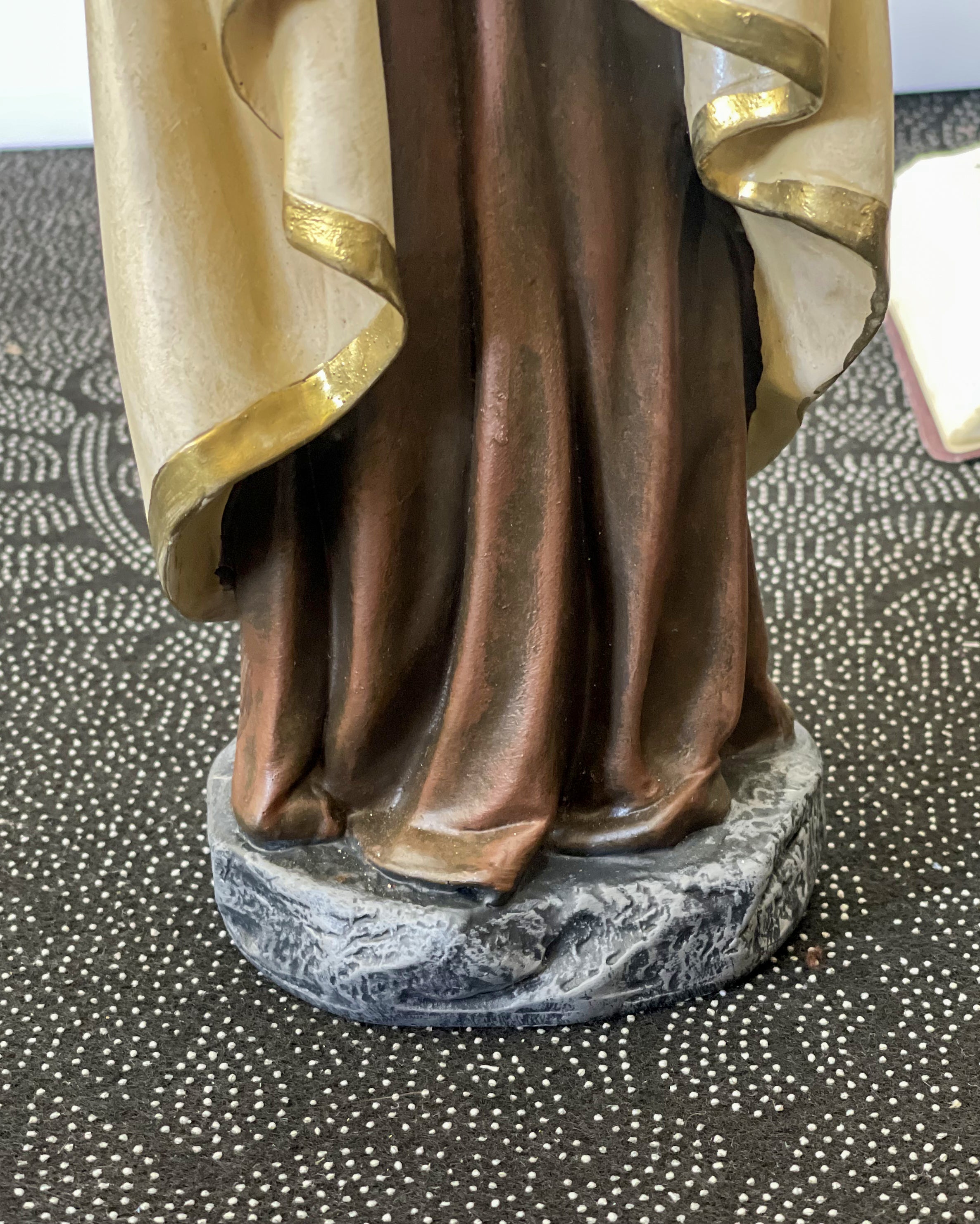 Hand-painted Saint Therese of Lisieux statue holding crucifix and roses