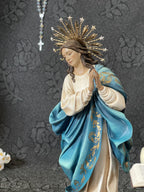 Hand-painted Immaculate Conception Virgin Mary statue with blue mantle, gold halo, and angel base