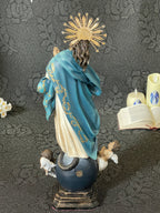 Hand-painted Immaculate Conception Virgin Mary statue with blue mantle, gold halo, and angel base