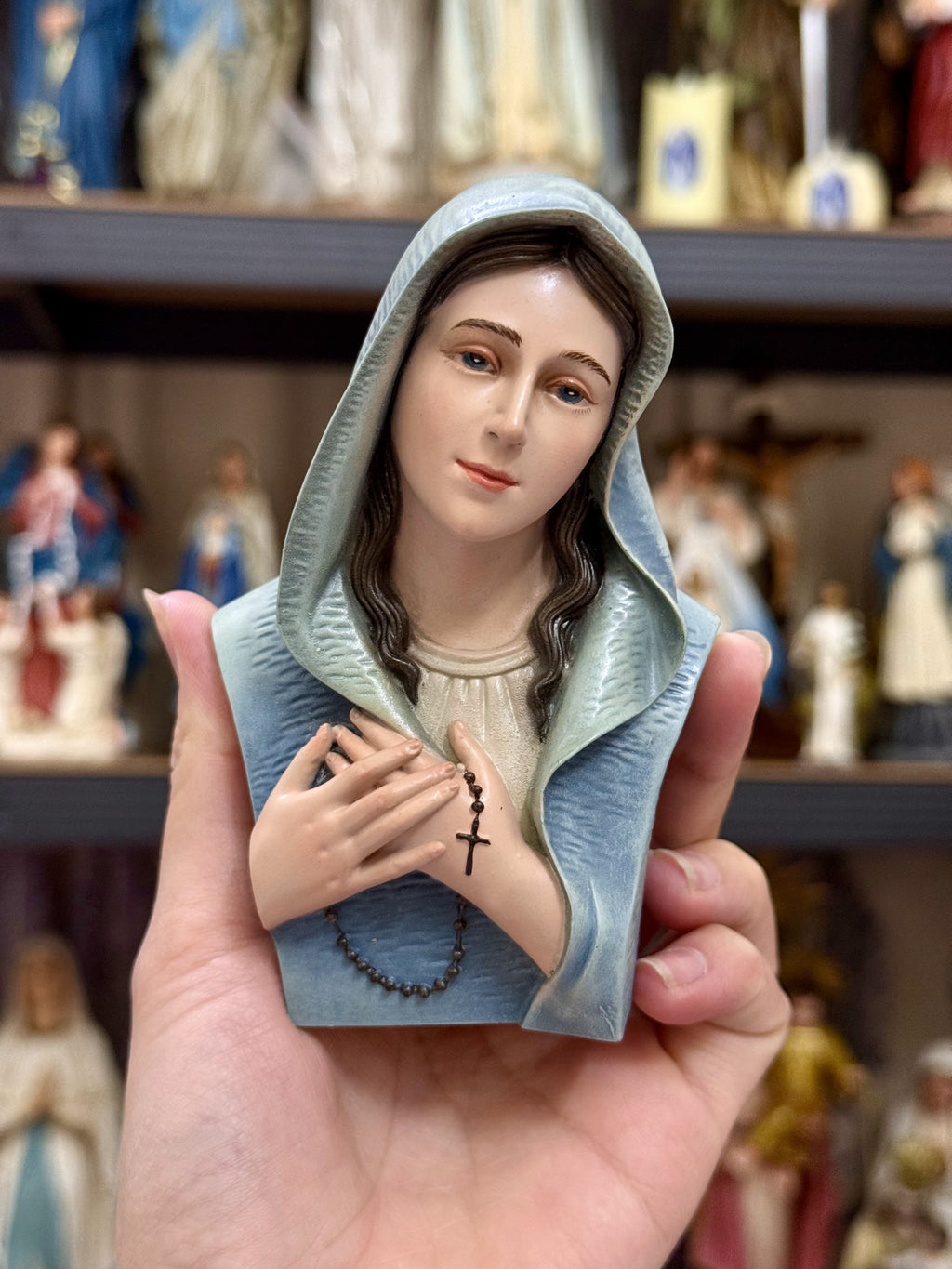 Mini hand-painted Blessed Virgin Mary bust statue with blue mantle, white veil, and rosary detail